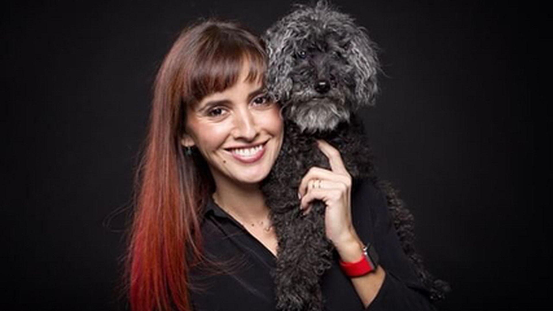 Maria San José tiene dos perros adoptados