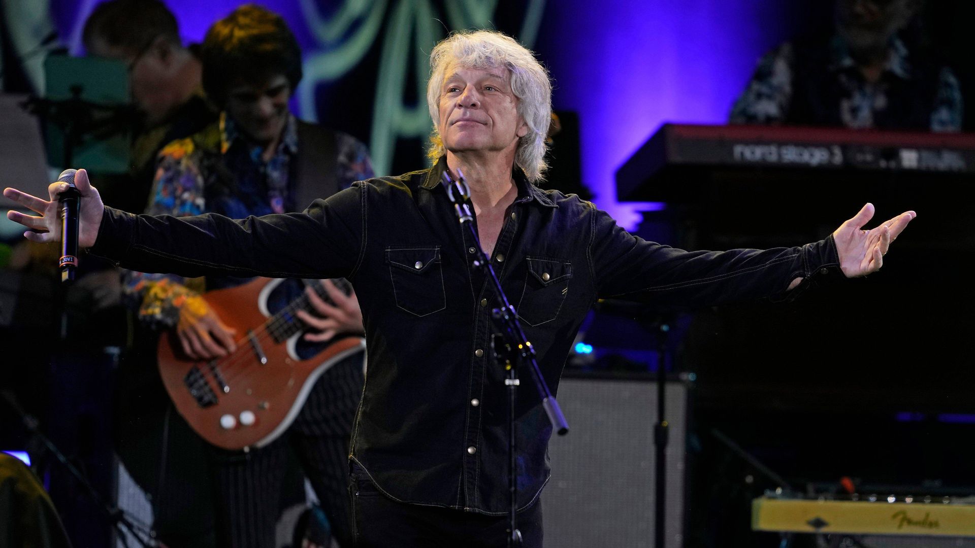 Jon Bon Jovi en uno de sus conciertos Jon Bon Jovi en uno de sus conciertos