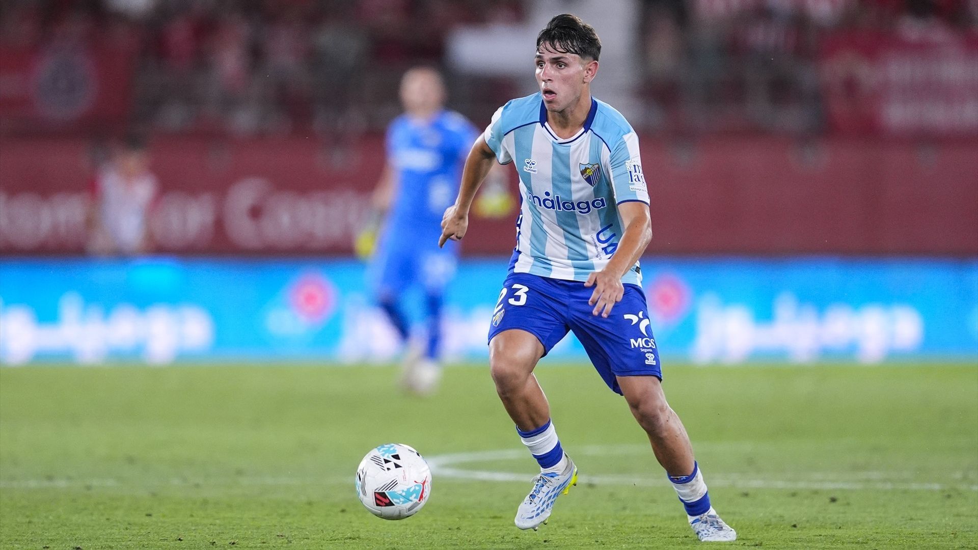 Izan Merino durante un partido del Málaga