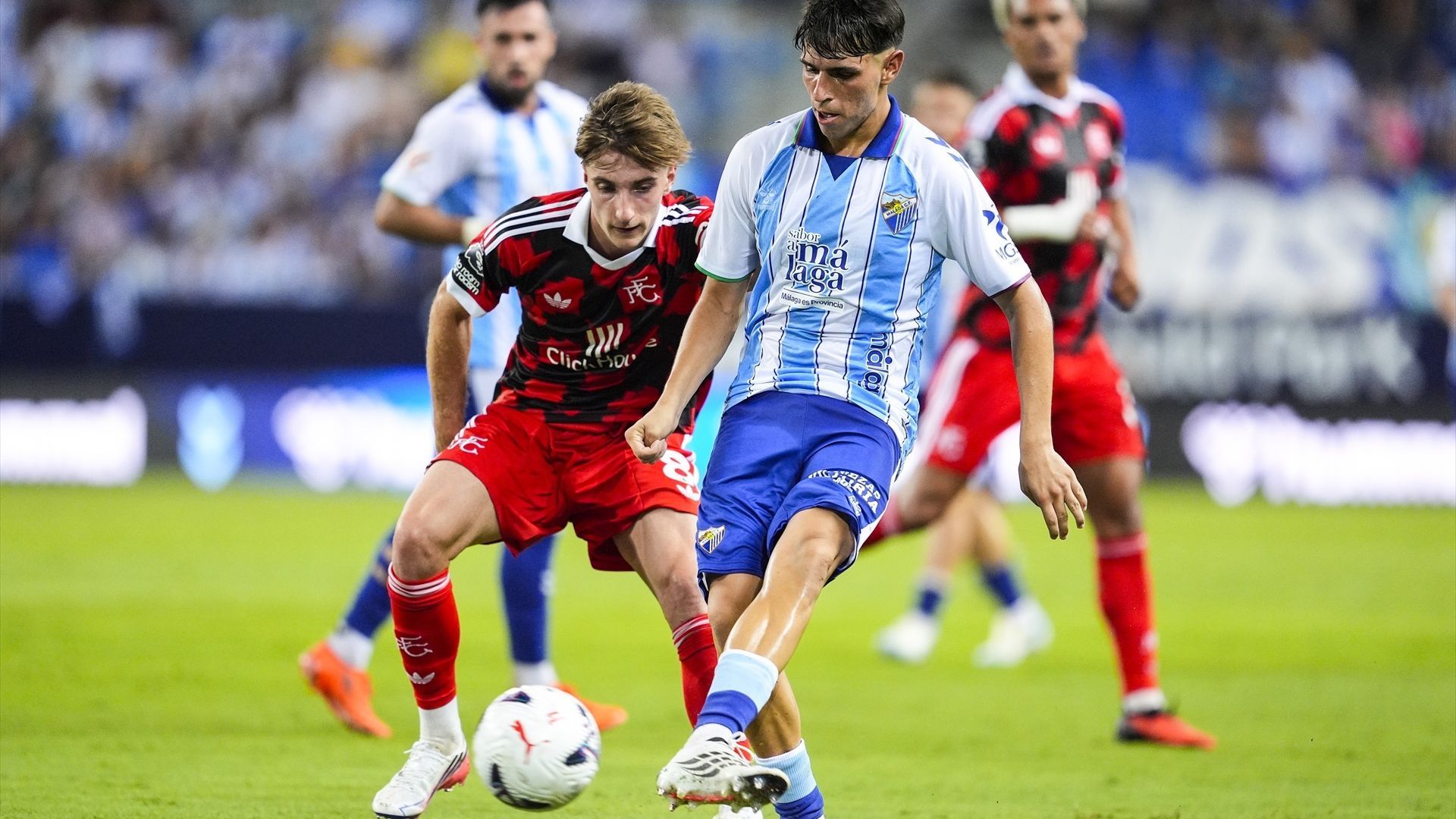 Izan Merino durante un partido de pretemporada del Málaga
