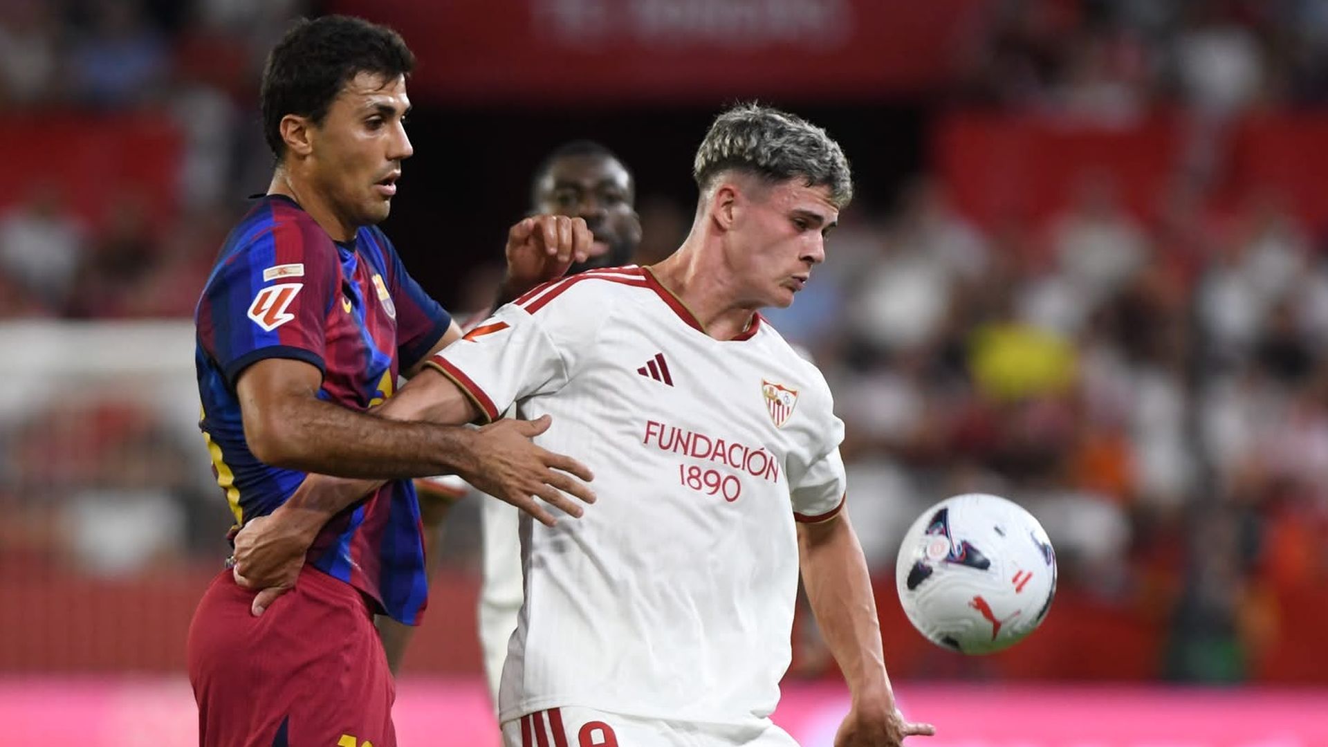 Robbie Ure y Rodri, en el Sevilla-Barcelona