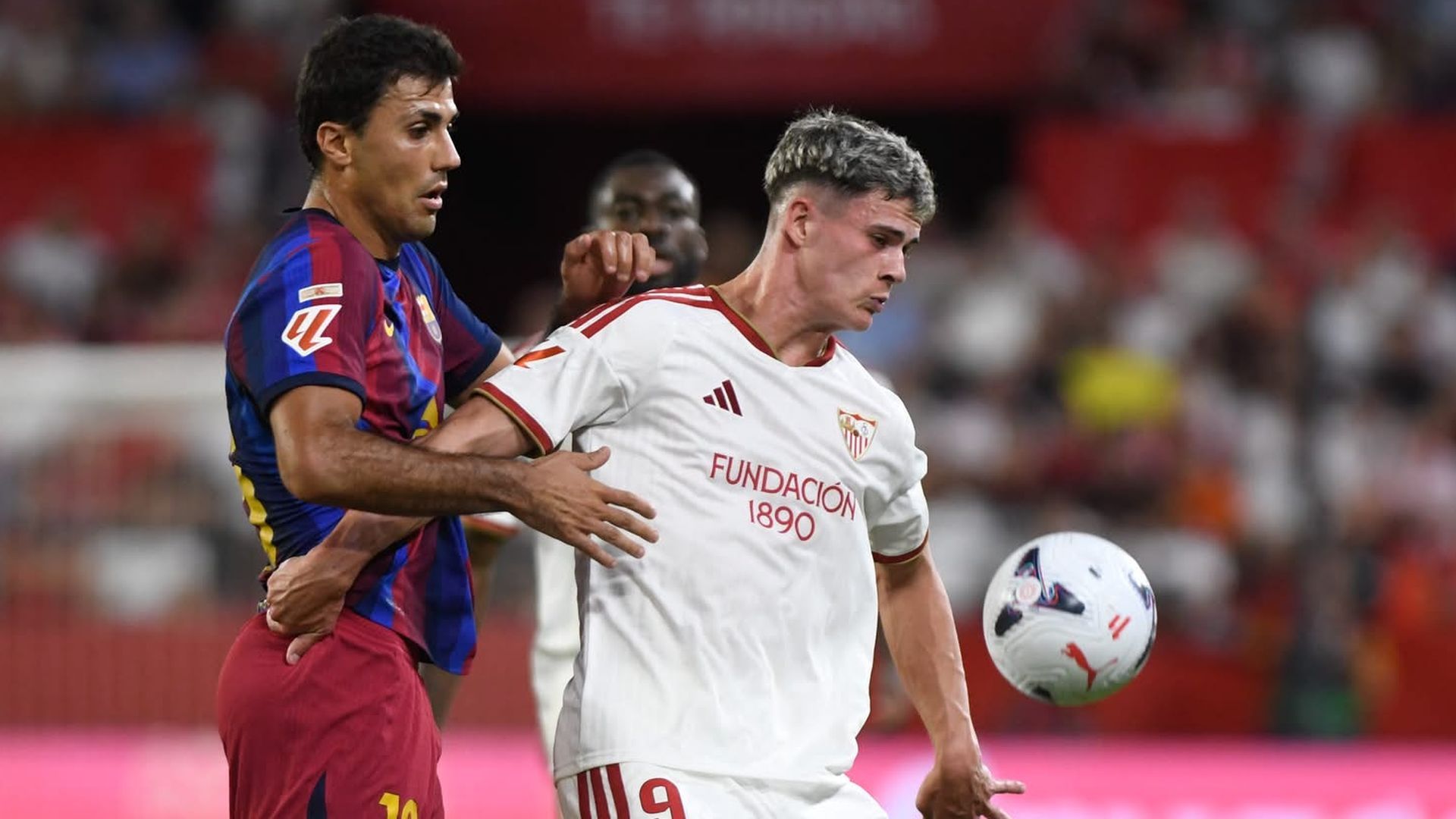 Robbie Ure y Rodri, en el Sevilla-Barcelona
