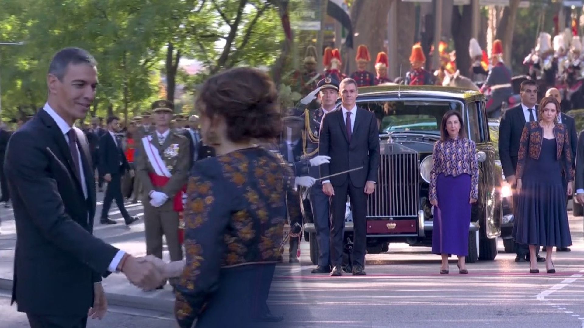 El saludo entre Pedro Sánchez e Isabel Díaz Ayuso antes del desfile y su distanciamiento durante el himno nacional con un hueco vacío y la ministra Robles en medio