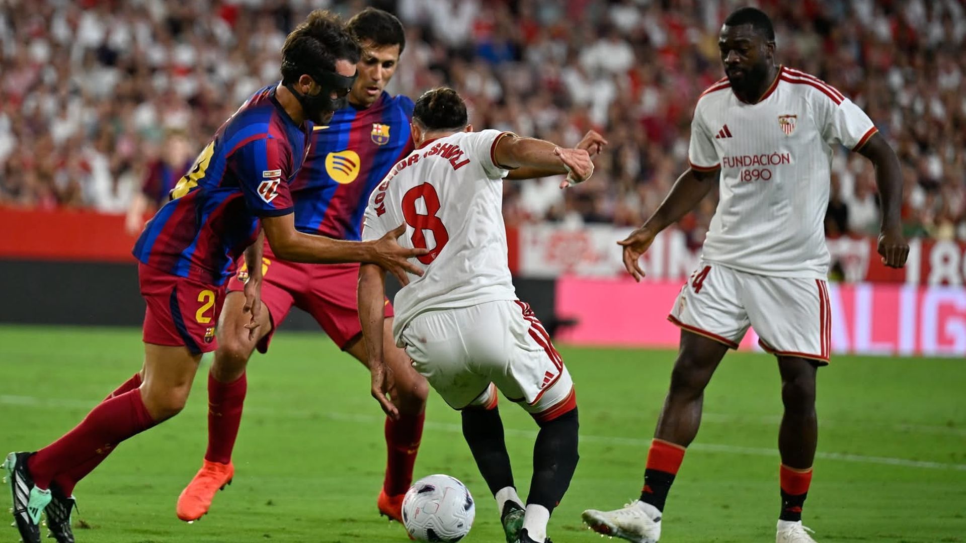 Kochorashvili y Eric García, en el Sevilla-Barcelona